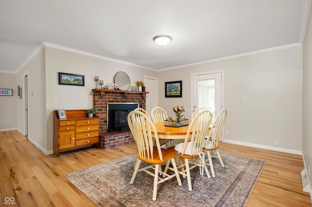 9104 W Lone Beech Dr, Muncie, IN 47304 - dining space with ornamental molding, light wood finished floors, and baseboards