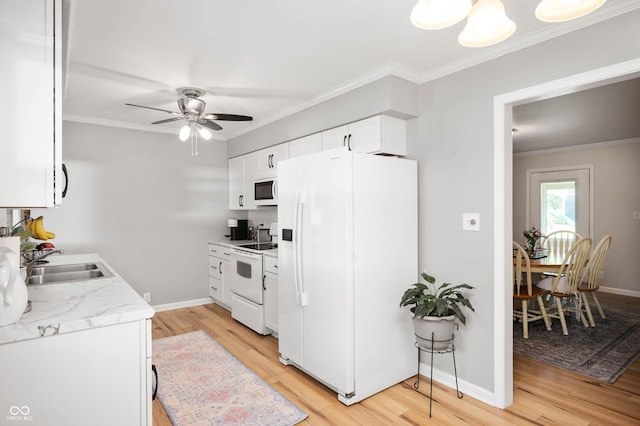 9104 W Lone Beech Dr, Muncie, IN 47304 - kitchen featuring white appliances, light wood finished floors, a sink, ceiling fan, and crown molding