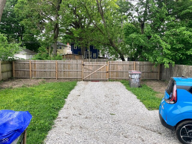 1114 N Olney St, Indianapolis, IN 46201 - view of yard with fence and a gate