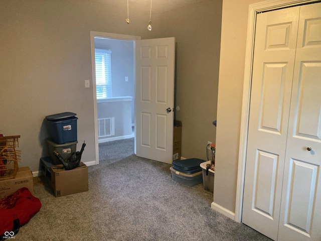 1114 N Olney St, Indianapolis, IN 46201 - unfurnished bedroom with carpet and baseboards