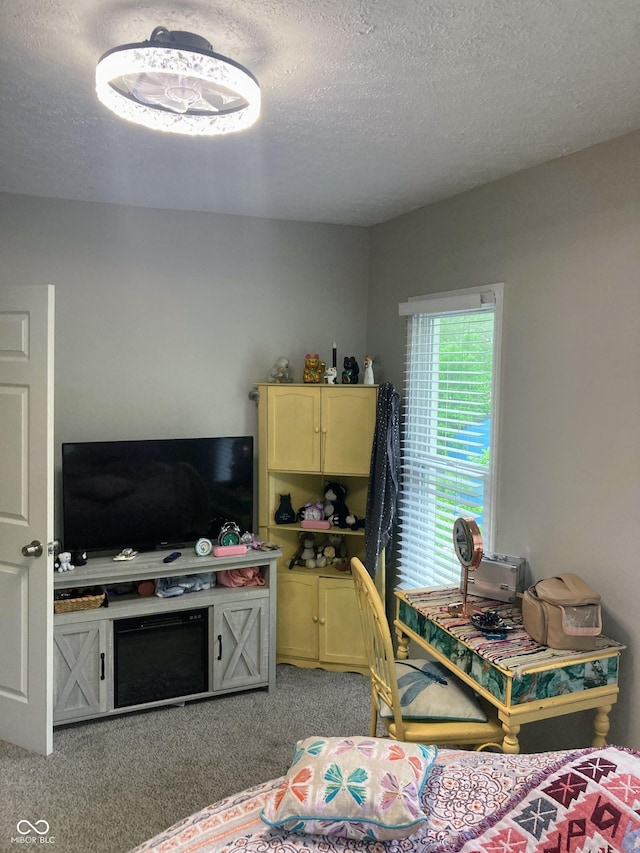 1114 N Olney St, Indianapolis, IN 46201 - bedroom with light carpet and a textured ceiling