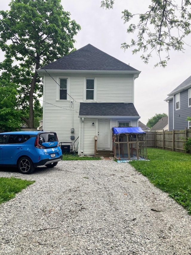 1114 N Olney St, Indianapolis, IN 46201 - back of property with gravel driveway