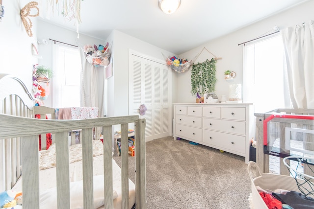 1913 Pennsylvania St, Columbus, IN 47201 - bedroom with carpet floors, a closet, and a nursery area