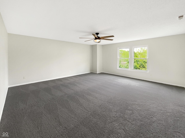 2116 Orchid Bloom Dr, Indianapolis, IN 46231 - unfurnished room with a ceiling fan, dark colored carpet, and baseboards