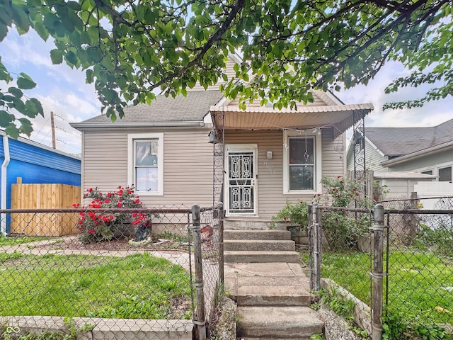 2006 N Olney St, Indianapolis, IN 46218 - view of front of property featuring a shingled roof
