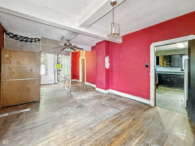 2006 N Olney St, Indianapolis, IN 46218 - garage with ceiling fan and baseboards