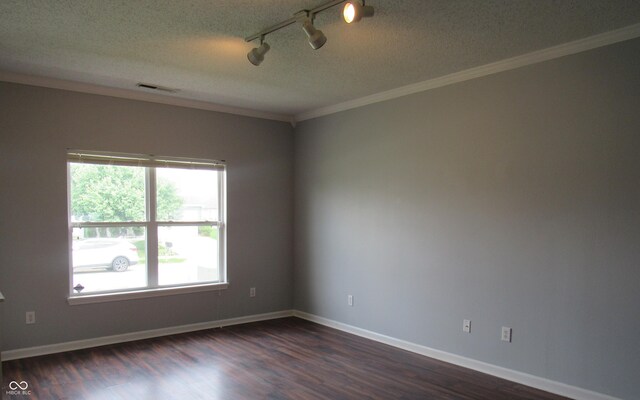 3908 Roundwood Dr, Indianapolis, IN 46235 - unfurnished room featuring a textured ceiling, ornamental molding, dark wood finished floors, baseboards, and track lighting