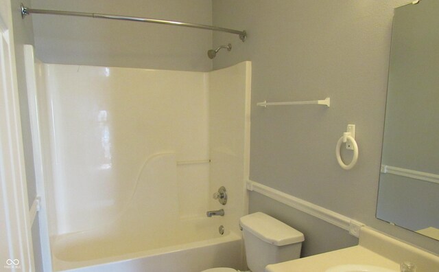 3908 Roundwood Dr, Indianapolis, IN 46235 - bathroom featuring toilet, shower / washtub combination, and vanity