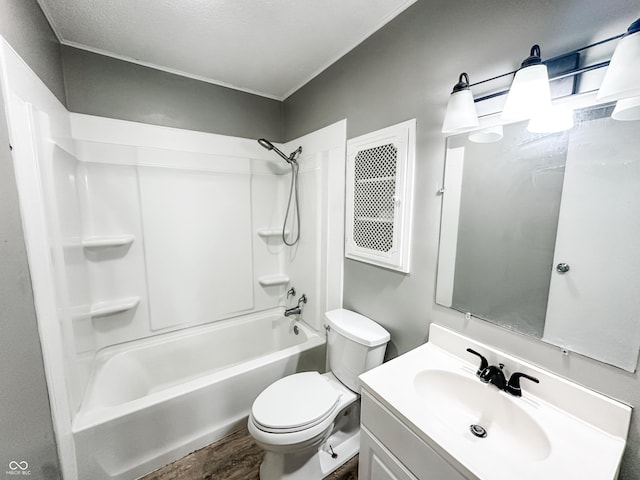 2419 Tamarack Pl, Anderson, IN 46011 - bathroom featuring toilet, vanity, shower / bathtub combination, and wood finished floors