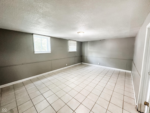 2419 Tamarack Pl, Anderson, IN 46011 - unfurnished room featuring a textured ceiling and baseboards