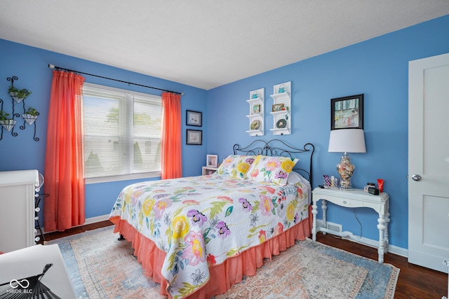 2021 Chestnut St, Columbus, IN 47201 - bedroom with wood finished floors and baseboards