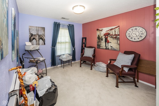 1602 Queensbridge Sq Unit 7, Indianapolis, IN 46219 - living area featuring carpet flooring and baseboards