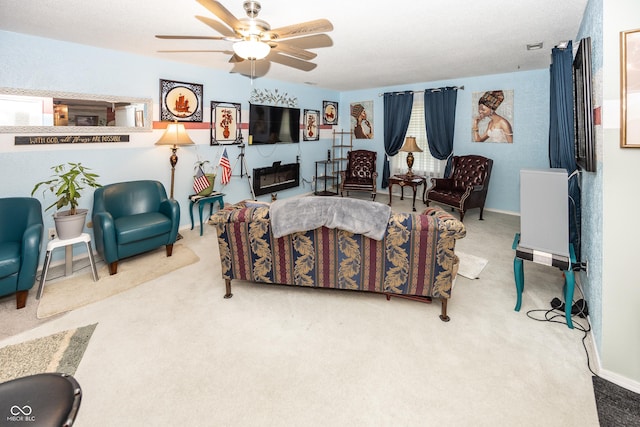 1602 Queensbridge Sq Unit 7, Indianapolis, IN 46219 - living area with carpet flooring and ceiling fan