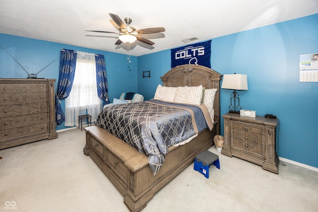 1602 Queensbridge Sq Unit 7, Indianapolis, IN 46219 - carpeted bedroom with ceiling fan and baseboards