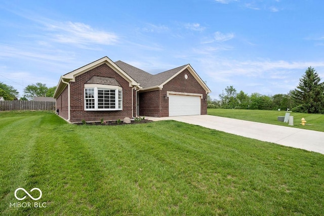 2502 Chrystal Woods Dr, Kokomo, IN 46901 - ranch-style house with brick siding, concrete driveway, and an attached garage