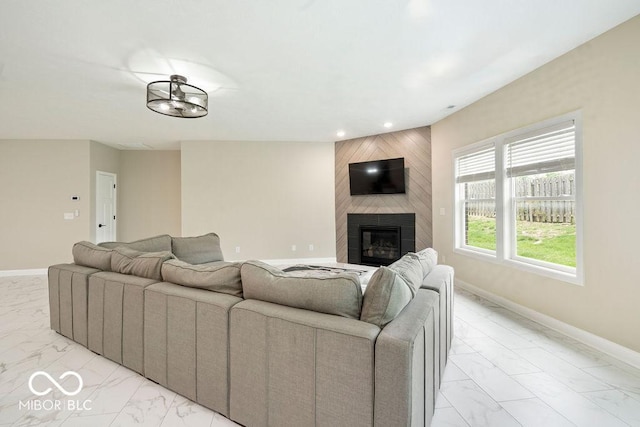 2502 Chrystal Woods Dr, Kokomo, IN 46901 - living room featuring light marble finish flooring, baseboards, a fireplace, and recessed lighting