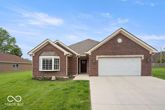 2502 Chrystal Woods Dr, Kokomo, IN 46901 - ranch-style house featuring brick siding, a front yard, an attached garage, and concrete driveway