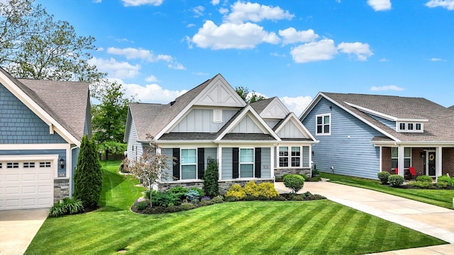 craftsman-style house featuring board and batten siding, stone siding, a front yard, and concrete driveway