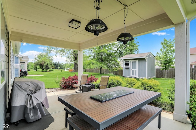 view of patio with grilling area and outdoor dining area