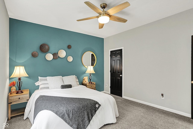 bedroom featuring carpet flooring, baseboards, and ceiling fan