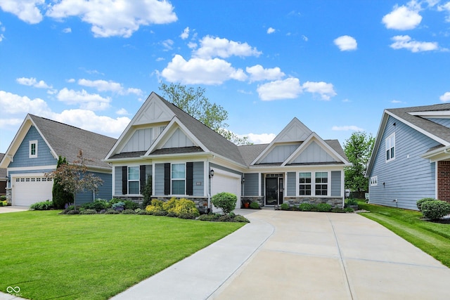 craftsman house featuring board and batten siding, an attached garage, and a front yard