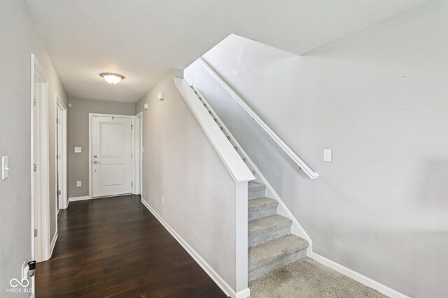 220 Sawdust Trl, Greenfield, IN 46140 - foyer with wood finished floors and stairway