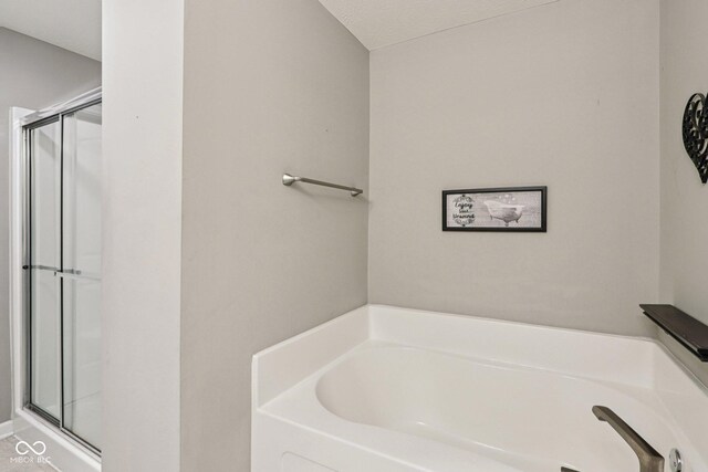220 Sawdust Trl, Greenfield, IN 46140 - full bathroom with a bath and a shower stall