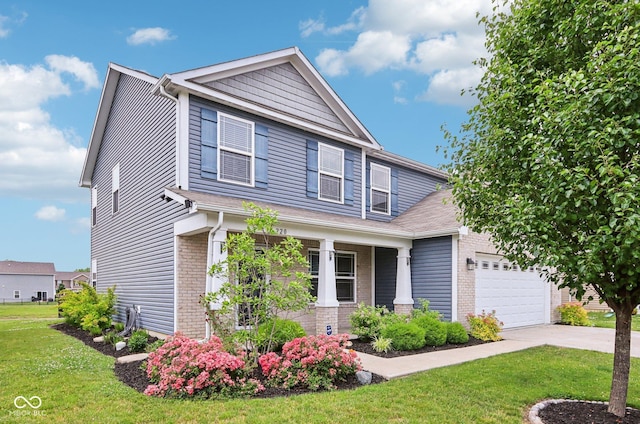 220 Sawdust Trl, Greenfield, IN 46140 - craftsman-style home featuring brick siding, a front yard, driveway, and an attached garage
