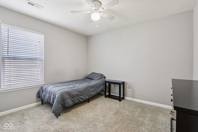 220 Sawdust Trl, Greenfield, IN 46140 - carpeted bedroom with multiple windows and ceiling fan