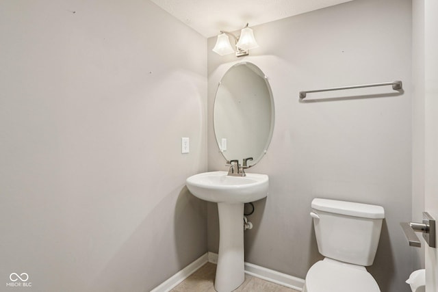 220 Sawdust Trl, Greenfield, IN 46140 - bathroom featuring toilet and baseboards