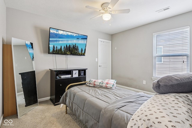 220 Sawdust Trl, Greenfield, IN 46140 - bedroom with light carpet and ceiling fan
