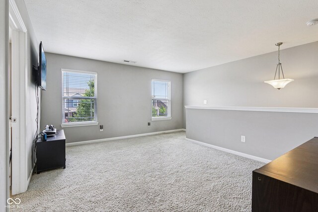220 Sawdust Trl, Greenfield, IN 46140 - unfurnished room featuring plenty of natural light and light carpet
