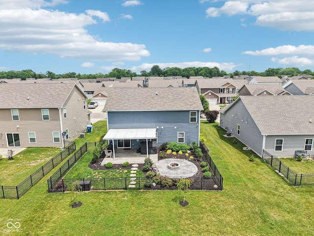 220 Sawdust Trl, Greenfield, IN 46140 - back of property with a fire pit, a residential view, a patio, and a fenced backyard