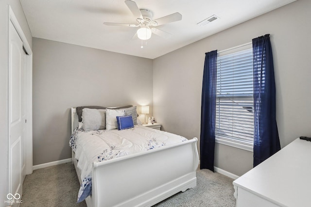 220 Sawdust Trl, Greenfield, IN 46140 - bedroom featuring light colored carpet, a closet, and ceiling fan