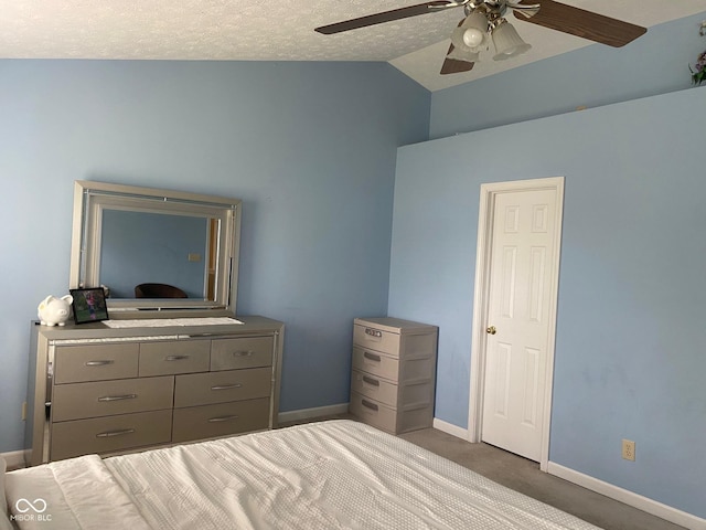 5241 Waterton Lakes Dr, Indianapolis, IN 46237 - carpeted bedroom with vaulted ceiling, baseboards, and a ceiling fan