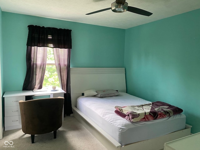 5241 Waterton Lakes Dr, Indianapolis, IN 46237 - bedroom with light carpet and a ceiling fan