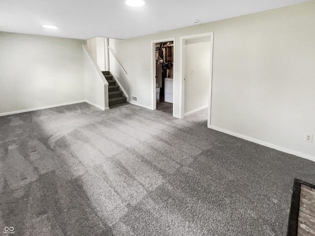 finished basement featuring stairway, baseboards, carpet flooring, and recessed lighting