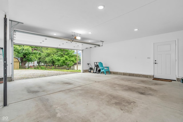 353 S Indiana St, Danville, IN 46122 - garage with recessed lighting and a garage door opener