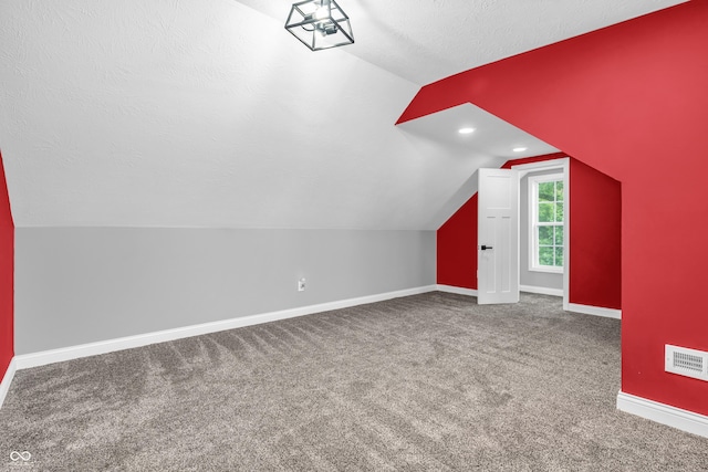353 S Indiana St, Danville, IN 46122 - bonus room with vaulted ceiling, baseboards, carpet flooring, recessed lighting, and a textured ceiling