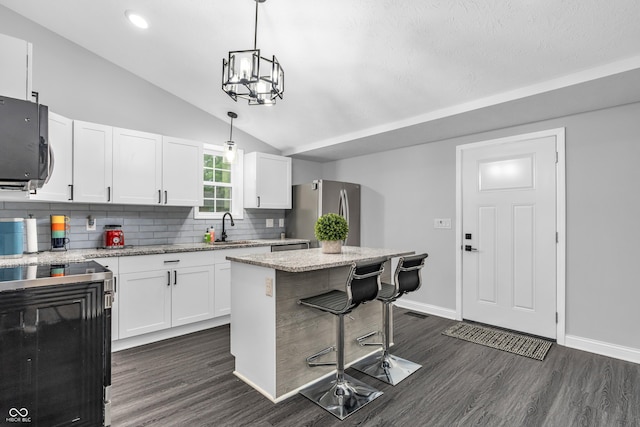 353 S Indiana St, Danville, IN 46122 - kitchen with freestanding refrigerator, dark wood-type flooring, decorative backsplash, baseboards, and a sink