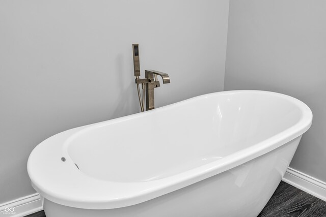 353 S Indiana St, Danville, IN 46122 - bathroom view of a freestanding bath and baseboards