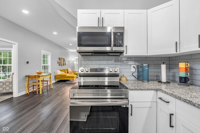 353 S Indiana St, Danville, IN 46122 - kitchen featuring appliances with stainless steel finishes, backsplash, white cabinetry, and recessed lighting