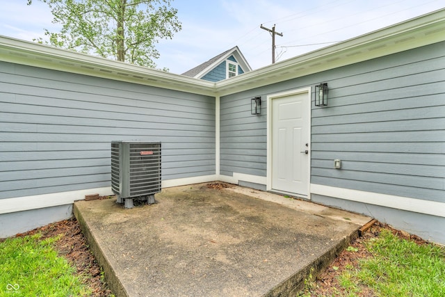 353 S Indiana St, Danville, IN 46122 - doorway to property with central AC unit and a patio area