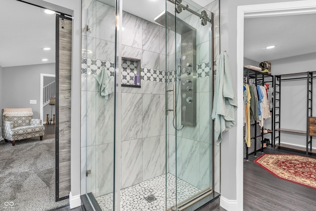 353 S Indiana St, Danville, IN 46122 - full bath featuring recessed lighting, a stall shower, wood finished floors, ensuite bath, and baseboards