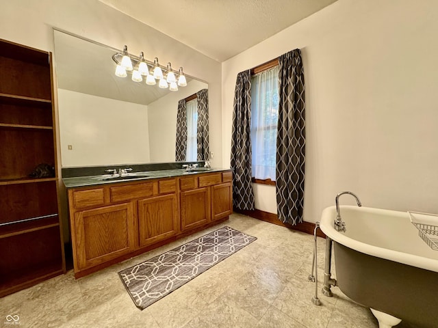 308 W Walnut St, Brownstown, IN 47220 - bathroom featuring double vanity and a freestanding tub