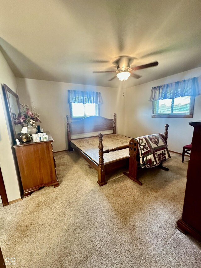 1154 W US Highway 136, Veedersburg, IN 47987 - bedroom featuring light colored carpet and ceiling fan