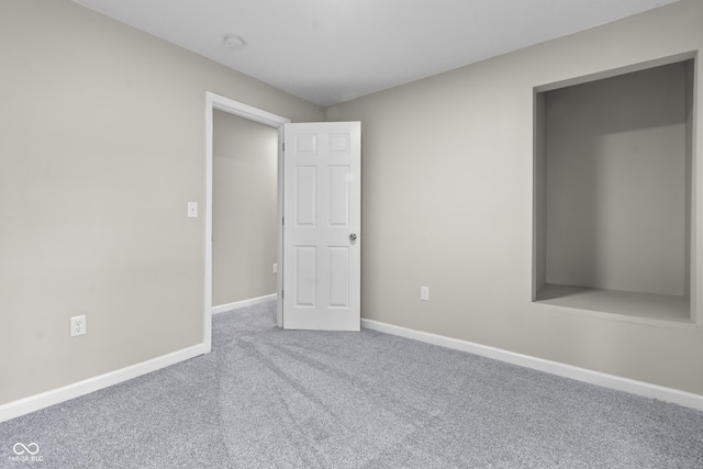 418 Harlan St, Indianapolis, IN 46201 - carpeted empty room featuring baseboards and a smoke detector