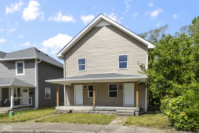 418 Harlan St, Indianapolis, IN 46201 - view of front facade with a porch