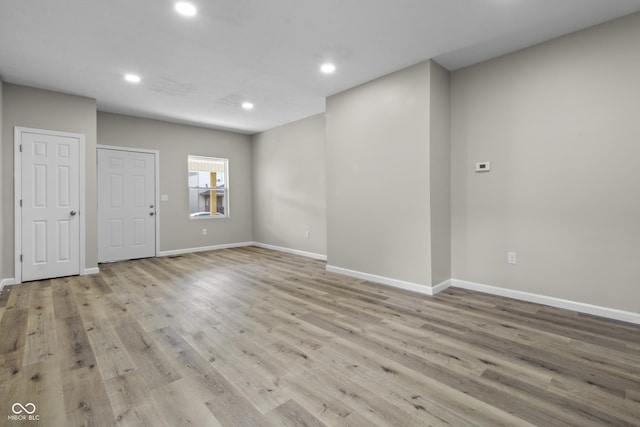 418 Harlan St, Indianapolis, IN 46201 - unfurnished room with recessed lighting, baseboards, and wood finished floors