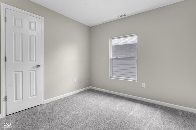 418 Harlan St, Indianapolis, IN 46201 - unfurnished room featuring carpet and baseboards